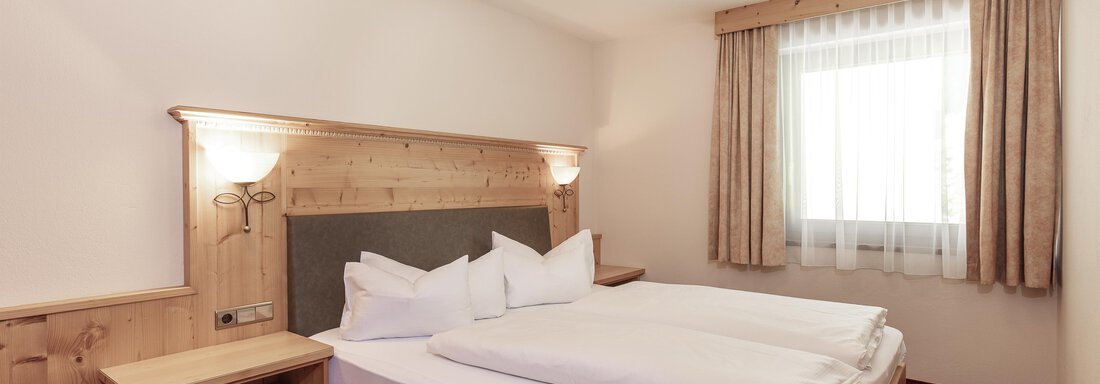 Schlafzimmer_TypLandhaus Schlafzimmer_TypLandhaus - Appartements Panorama - Längenfeld