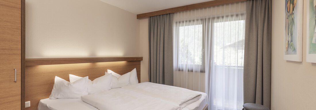 Schlafzimmer_Typ A Schlafzimmer_Typ A - Appartements Panorama - Längenfeld